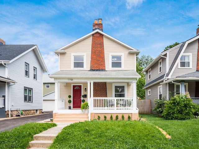 1156 S Champion Ave, Columbus, OH 43206 - view of front of home with a porch, a chimney, an outdoor structure, roof with shingles, and a garage