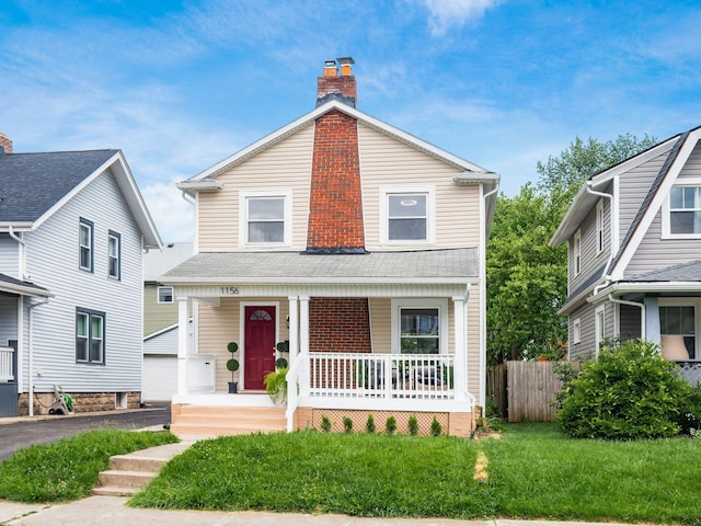 1156 S Champion Ave, Columbus, OH 43206 - view of front of property with a porch, a chimney, and a shingled roof