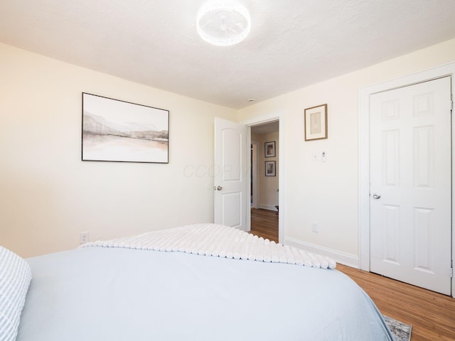 1156 S Champion Ave, Columbus, OH 43206 - bedroom with wood finished floors and baseboards