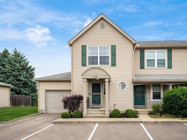 5678 Mango Ln Unit 104A, Hilliard, OH 43026 - traditional home with uncovered parking and a shingled roof