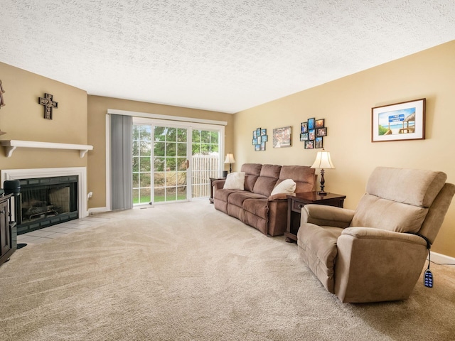5678 Mango Ln Unit 104A, Hilliard, OH 43026 - living room featuring carpet, a fireplace with flush hearth, a textured ceiling, and baseboards