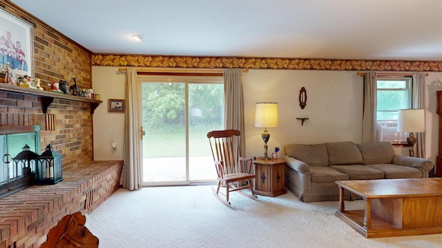 1371 Township Road 200, Bellefontaine, OH 43311 - living room featuring light carpet and a brick fireplace