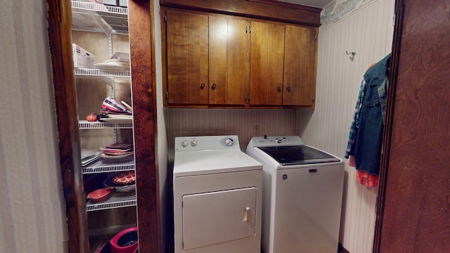 1371 Township Road 200, Bellefontaine, OH 43311 - laundry area featuring cabinet space and independent washer and dryer