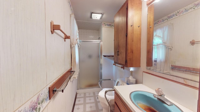1371 Township Road 200, Bellefontaine, OH 43311 - bathroom with tile patterned floors, toilet, a shower stall, and vanity
