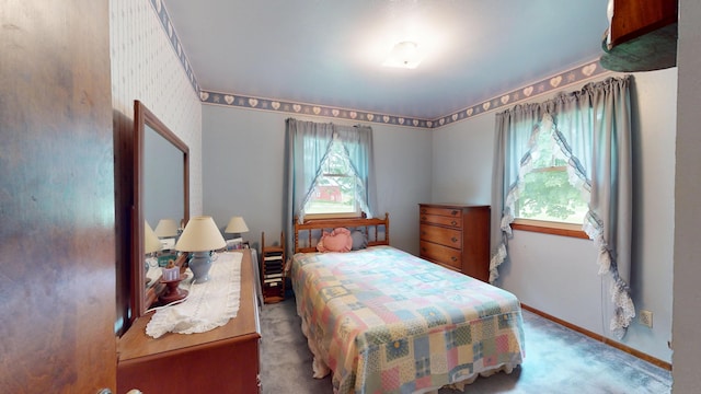 1371 Township Road 200, Bellefontaine, OH 43311 - carpeted bedroom featuring baseboards