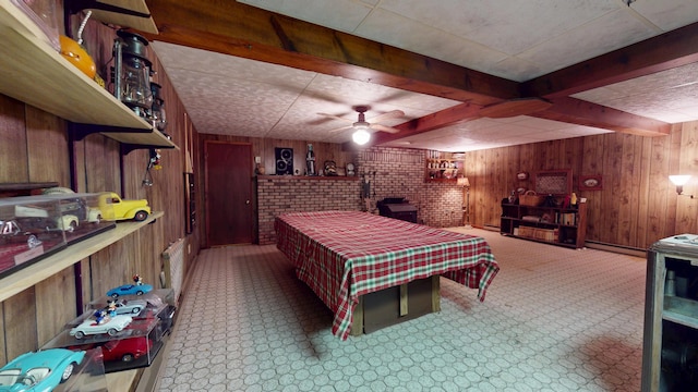 1371 Township Road 200, Bellefontaine, OH 43311 - bedroom with wood walls, beamed ceiling, and baseboard heating
