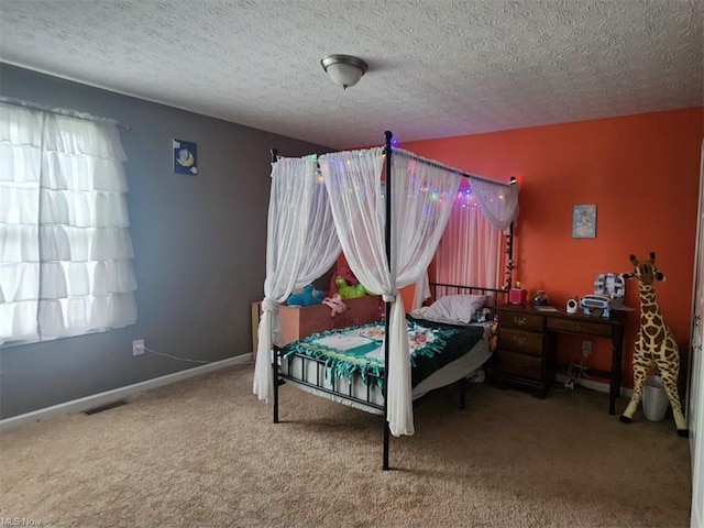 7360 Jones Rd, Nashport, OH 43830 - carpeted bedroom with a textured ceiling and baseboards