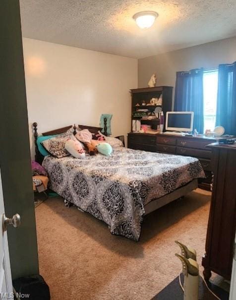 7360 Jones Rd, Nashport, OH 43830 - carpeted bedroom with a textured ceiling
