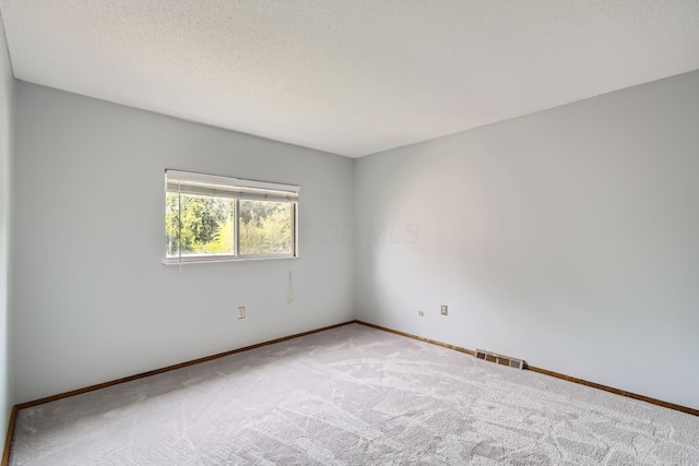 5827 Chanwick Dr, Galloway, OH 43119 - carpeted empty room with baseboards