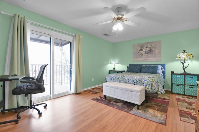 5885 Beechcroft Rd Unit 315, Columbus, OH 43229 - bedroom with access to exterior, wood finished floors, baseboards, and ceiling fan