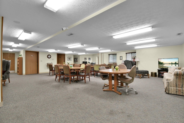 5885 Beechcroft Rd Unit 315, Columbus, OH 43229 - carpeted dining room with a textured ceiling