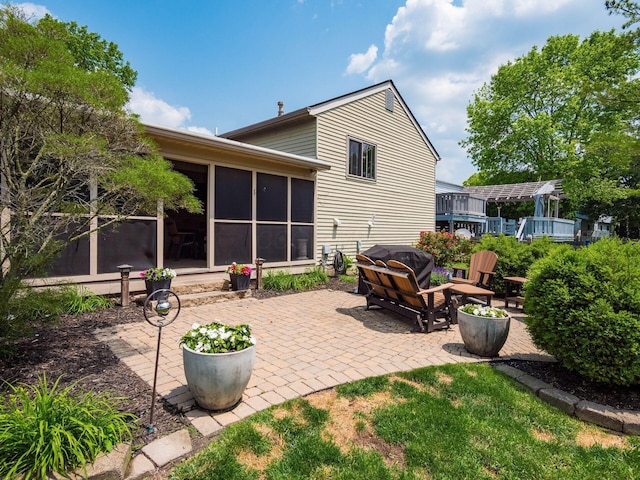 1835 Plains Blvd, Powell, OH 43065 - view of patio with a sunroom and grilling area