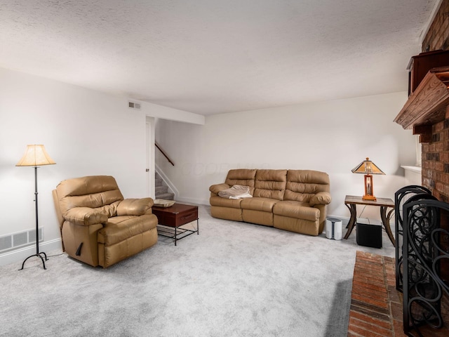 1835 Plains Blvd, Powell, OH 43065 - carpeted living area with stairway and a textured ceiling