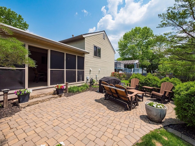 1835 Plains Blvd, Powell, OH 43065 - view of patio with a grill and a sunroom