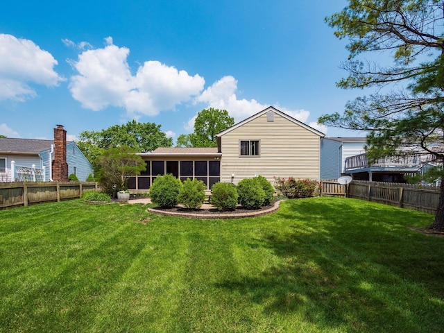 1835 Plains Blvd, Powell, OH 43065 - rear view of property with a sunroom and a fenced backyard