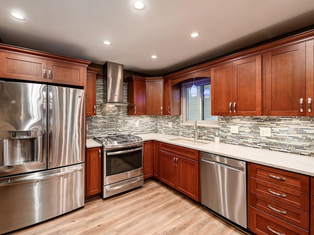 1835 Plains Blvd, Powell, OH 43065 - kitchen with appliances with stainless steel finishes, wall chimney range hood, light wood-style floors, backsplash, and light stone countertops