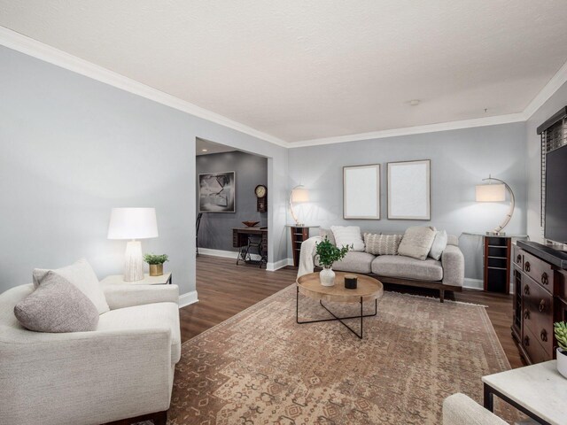 1835 Plains Blvd, Powell, OH 43065 - living area with crown molding and dark wood-type flooring
