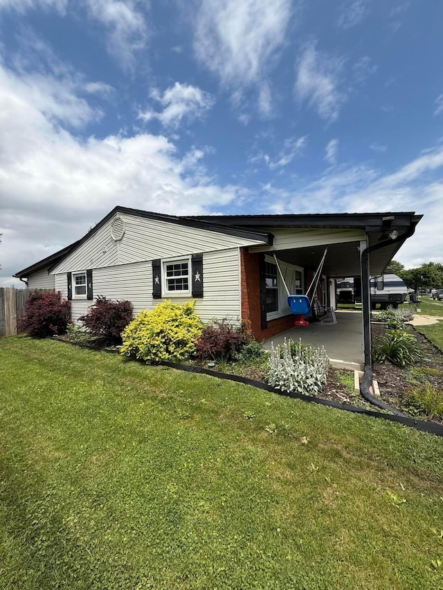 1775 Shoshoni Dr, Circleville, OH 43113 - view of property exterior featuring a lawn