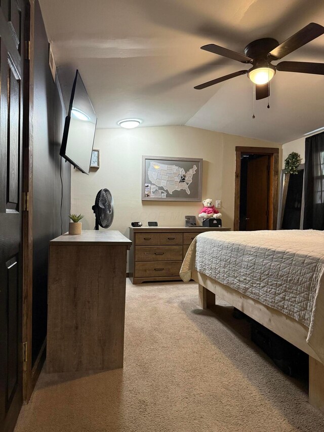 1775 Shoshoni Dr, Circleville, OH 43113 - bedroom featuring light carpet, vaulted ceiling, and a ceiling fan
