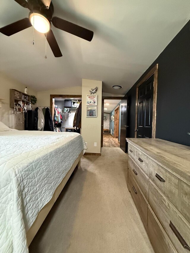 1775 Shoshoni Dr, Circleville, OH 43113 - bedroom featuring light carpet, vaulted ceiling, and ceiling fan
