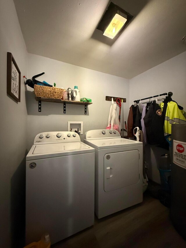 1775 Shoshoni Dr, Circleville, OH 43113 - laundry area with washing machine and clothes dryer, wood finished floors, and water heater
