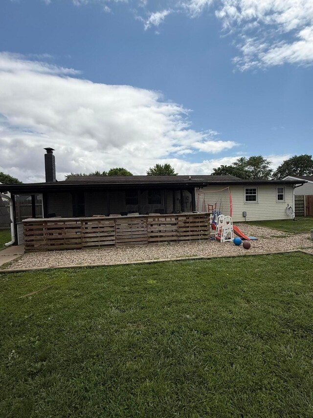 1775 Shoshoni Dr, Circleville, OH 43113 - back of house with a lawn and a chimney
