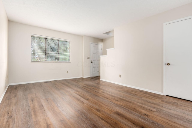 1955 Slaton Ct, Columbus, OH 43235 - spare room featuring wood finished floors and baseboards