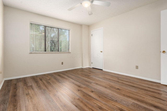 1955 Slaton Ct, Columbus, OH 43235 - empty room with a ceiling fan, wood finished floors, and baseboards