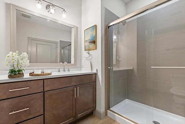 51 N High St # 806, Columbus, OH 43215 - bathroom with a shower stall and vanity