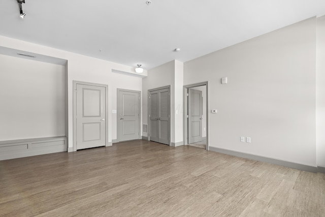 51 N High St # 806, Columbus, OH 43215 - empty room featuring light wood finished floors