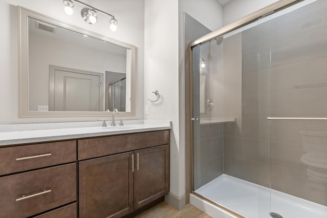 51 N High St # 806, Columbus, OH 43215 - bathroom with vanity and a stall shower