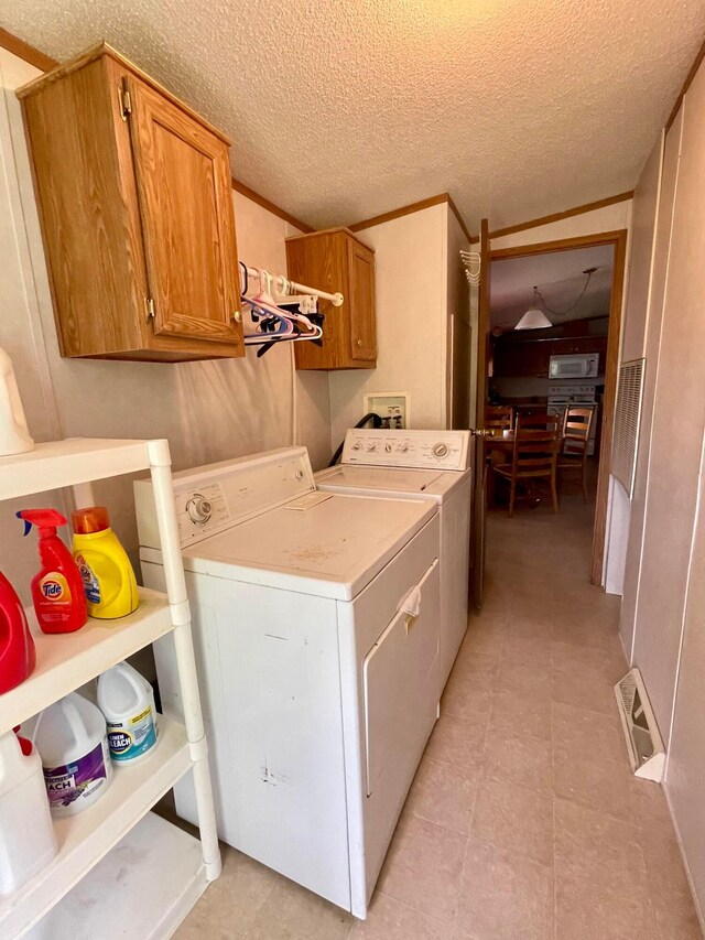 902 State Route 61 Lot # 92, Marengo, OH 43334 - washroom featuring cabinet space and washing machine and dryer