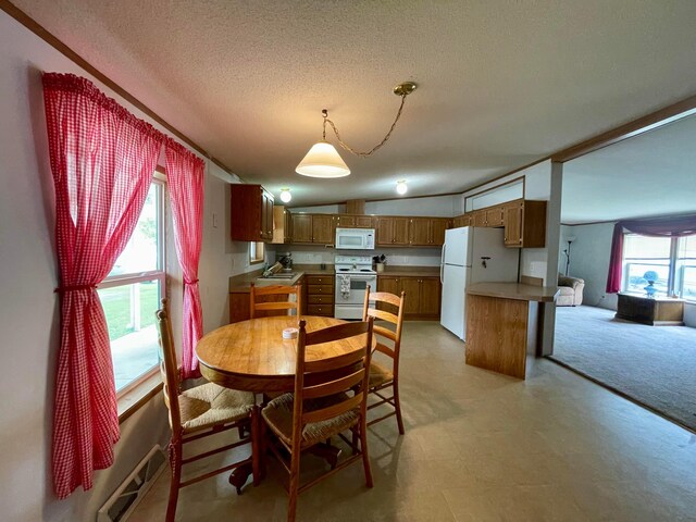 902 State Route 61 Lot # 92, Marengo, OH 43334 - dining area featuring a textured ceiling and light flooring
