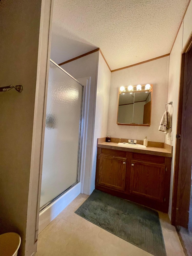 902 State Route 61 Lot # 92, Marengo, OH 43334 - bathroom with a stall shower, ornamental molding, vanity, and a textured ceiling