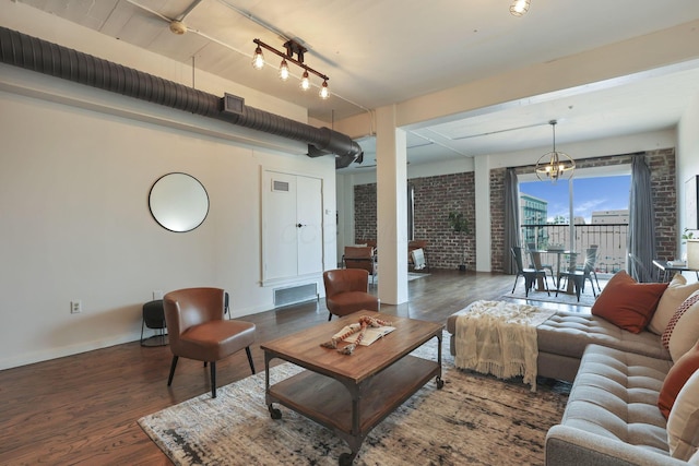432 E Rich St Unit 4A, Columbus, OH 43215 - living room featuring wood finished floors and a chandelier