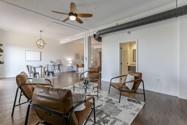 432 E Rich St Unit 4A, Columbus, OH 43215 - living room with a ceiling fan, wood finished floors, and a chandelier