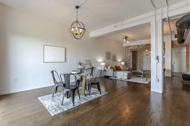 432 E Rich St Unit 4A, Columbus, OH 43215 - dining area with dark wood-type flooring, a chandelier, and beam ceiling