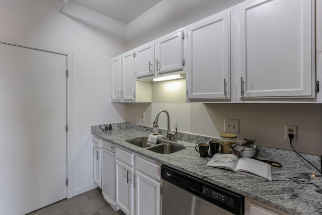 432 E Rich St Unit 4A, Columbus, OH 43215 - kitchen featuring dishwasher, white cabinetry, and light stone counters
