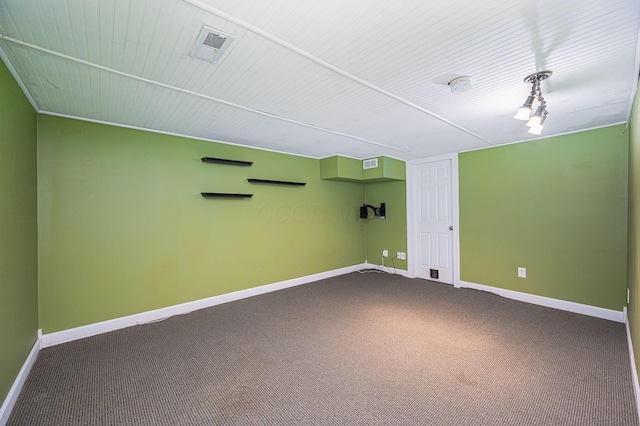 1845 Messner Dr Unit 57E, Hilliard, OH 43026 - empty room with dark carpet, baseboards, and a smoke detector