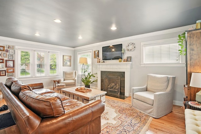 202 N Stanwood Rd, Bexley, OH 43209 - living area with crown molding, a fireplace with flush hearth, recessed lighting, and wood finished floors