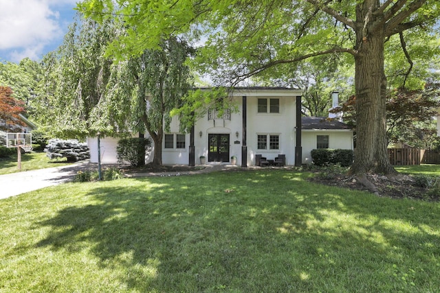 4286 Evansdale Rd, Columbus, OH 43214 - view of front of home featuring stucco siding, concrete driveway, and a garage
