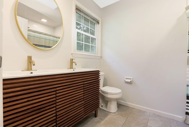 4286 Evansdale Rd, Columbus, OH 43214 - full bath with double vanity, tile patterned flooring, and a shower with shower curtain
