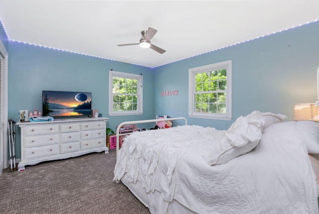 4286 Evansdale Rd, Columbus, OH 43214 - bedroom featuring dark colored carpet and a ceiling fan