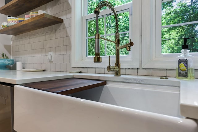 4286 Evansdale Rd, Columbus, OH 43214 - kitchen with open shelves, healthy amount of natural light, and decorative backsplash