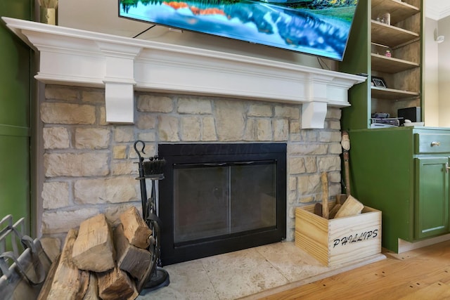 4286 Evansdale Rd, Columbus, OH 43214 - detailed view of a glass covered fireplace and wood finished floors