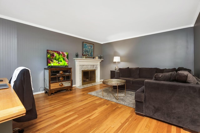 4286 Evansdale Rd, Columbus, OH 43214 - living area featuring light wood finished floors, ornamental molding, and a high end fireplace