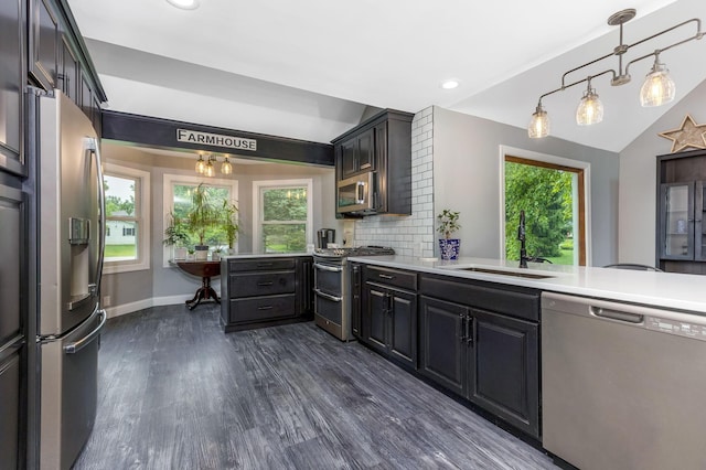 170 Nantucket Ave, Pickerington, OH 43147 - kitchen featuring appliances with stainless steel finishes, a peninsula, dark wood-style flooring, light countertops, and recessed lighting