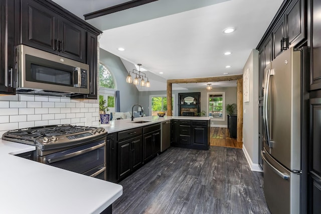 170 Nantucket Ave, Pickerington, OH 43147 - kitchen with appliances with stainless steel finishes, dark wood finished floors, tasteful backsplash, light countertops, and recessed lighting
