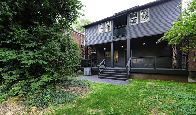 39 Auburn Ave, Columbus, OH 43205 - rear view of property featuring a yard and central air condition unit