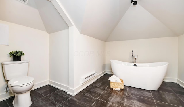 39 Auburn Ave, Columbus, OH 43205 - full bathroom featuring a baseboard radiator, lofted ceiling, a soaking tub, toilet, and baseboards